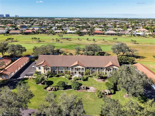 Aerial view of residential area with a local golf course