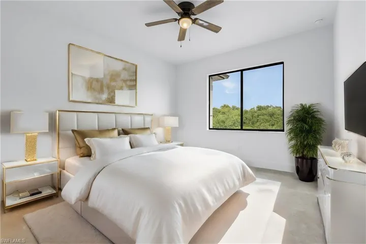 Bedroom featuring ceiling fan
