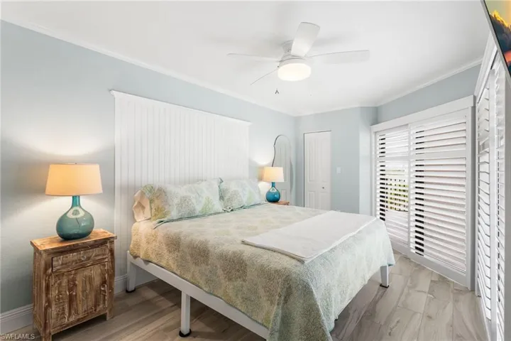 Spacious bedroom with large closet and Plantation Shutters.