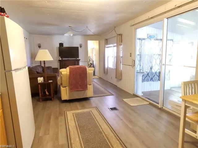 Living room featuring light wood-style floors
