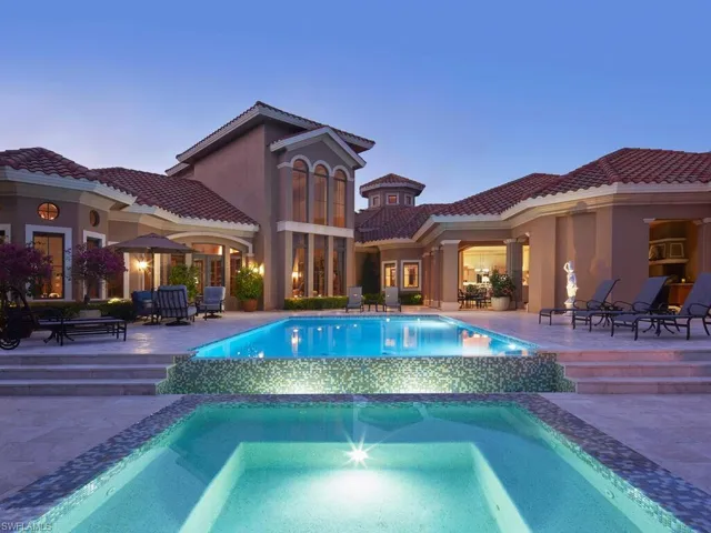 Relaxing pool / spa featuring a patio area
