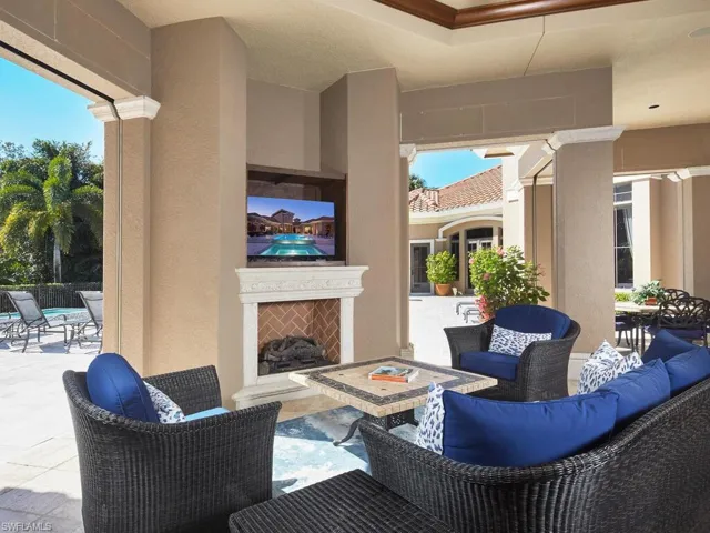 View of patio / terrace with an outdoor living space with a fireplace