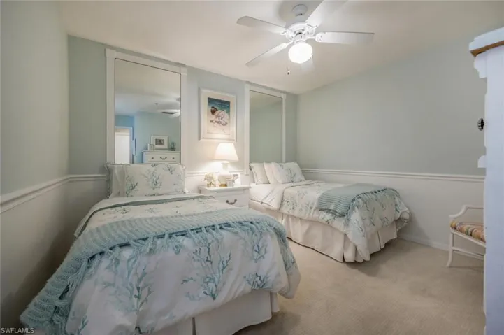 Bedroom with carpet and ceiling fan