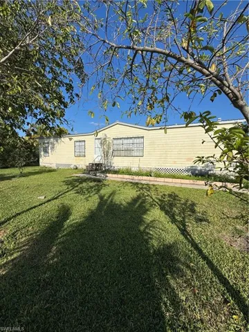 View of front of home with a front lawn