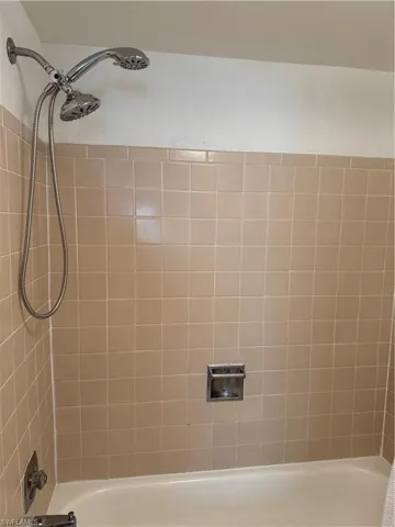 Bathroom featuring shower / tub combination