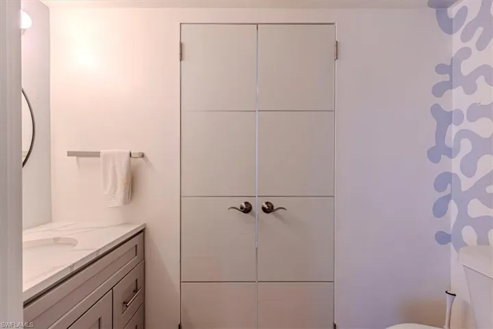 Bathroom with vanity and toilet