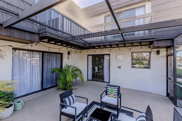 View of patio with outdoor furniture