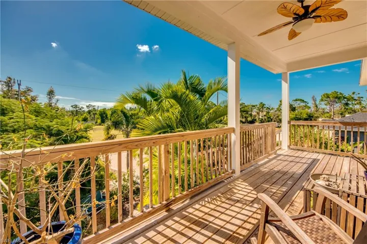 Wooden terrace with ceiling fan