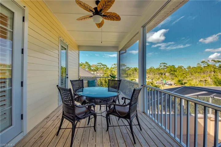 Wooden terrace with ceiling fan