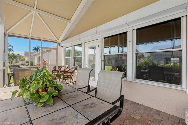 Sunroom with lofted ceiling
