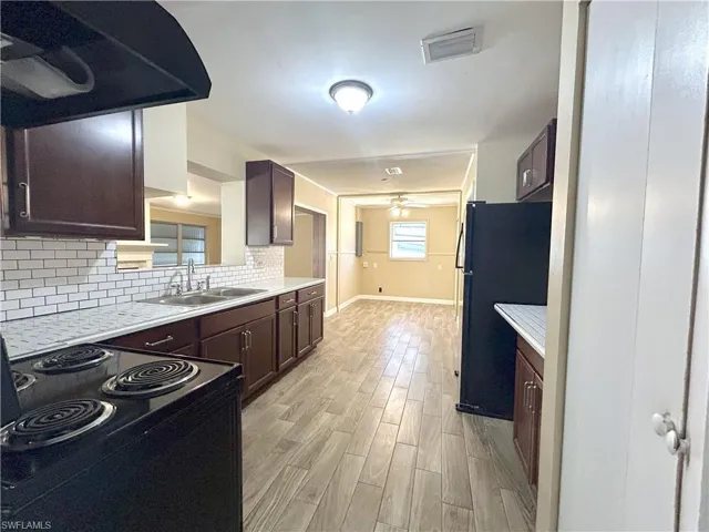 Kitchen with pantry closet to rihgt