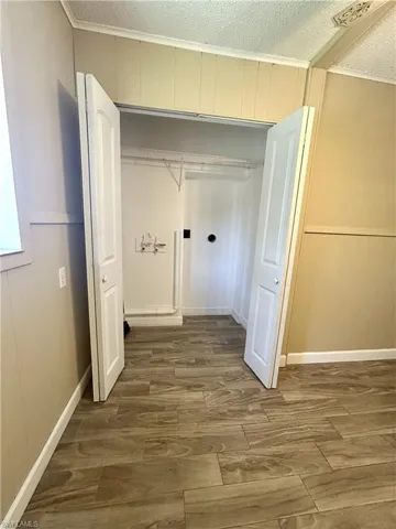 Laundry closet off breakfast room