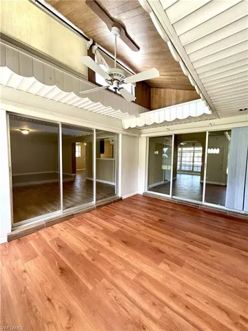 Sunroom looking to formal dining and family room