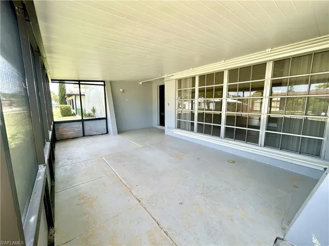 Front screened porch under cover