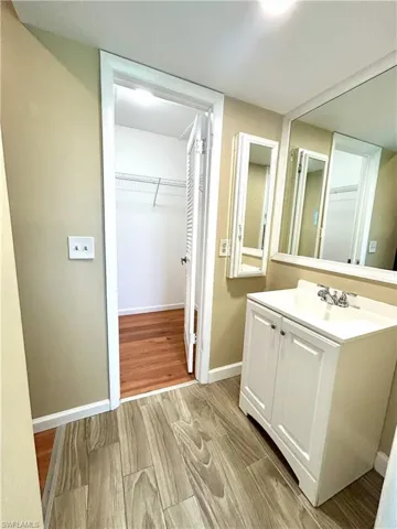Master bath separate vanity area and walk-in closet