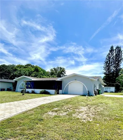 Concrete pad to right of home