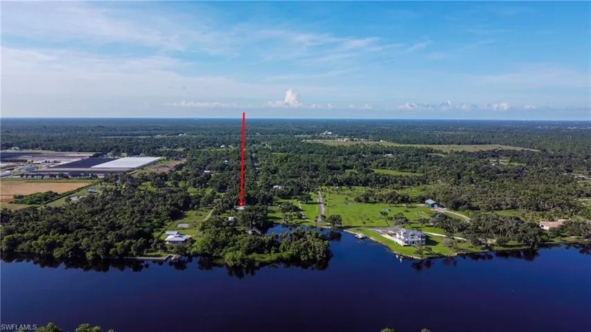Riverfront property, with dock on protected cove.