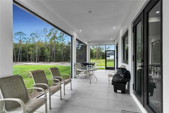 Sunroom featuring recessed lighting