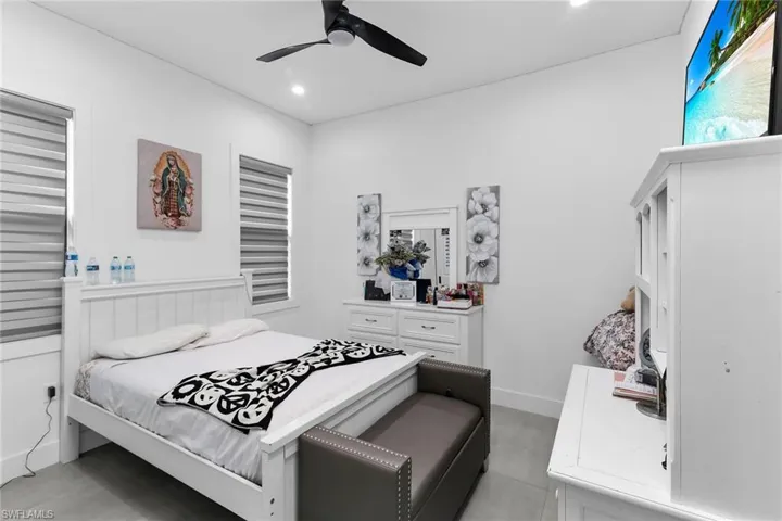 Bedroom featuring ceiling fan and recessed lighting