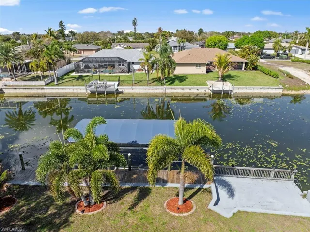 Aerial view of residential area with a nearby body of water