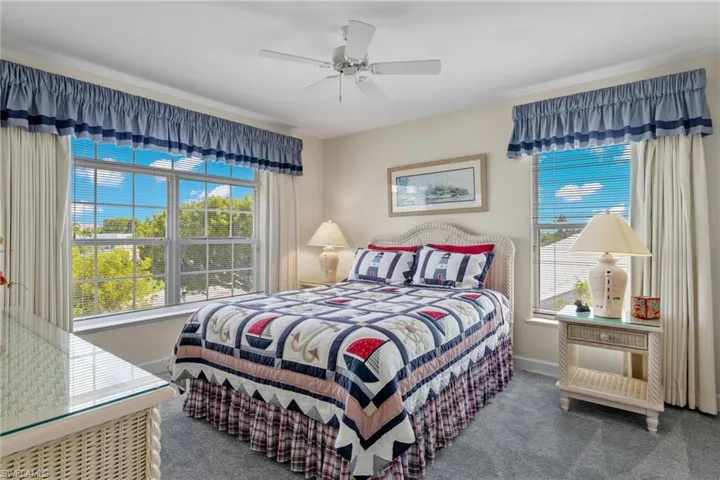 Bedroom featuring carpet and a ceiling fan
