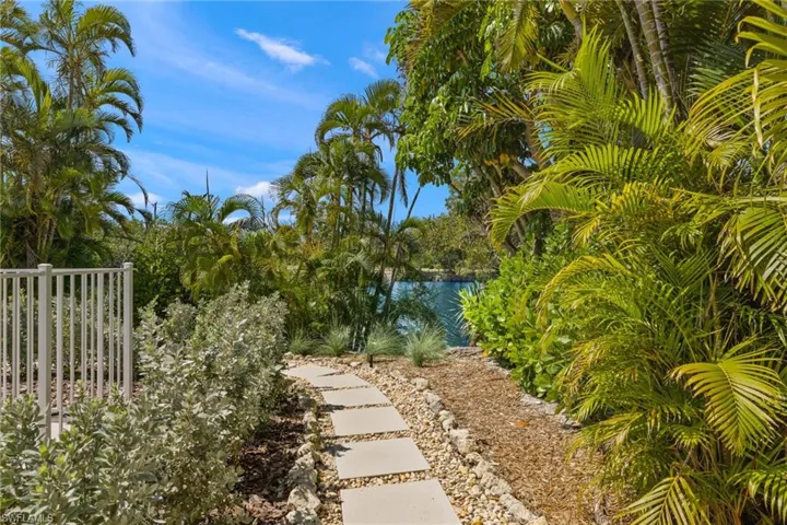 View of yard with a water view