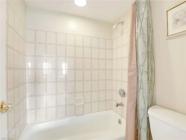 Primary Ensuite Tub/Shower Combo and Toilet Room