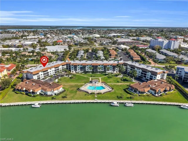 Aerial Rear View of the Building and Community Pool