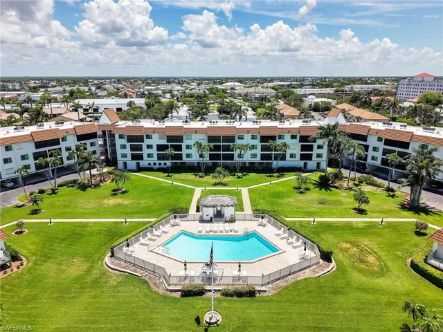 Aerial Rear View of the Building with Community Pool