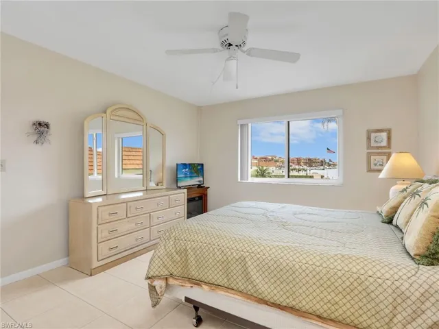 Primary Bedroom with Ceiling Fan and Bay View