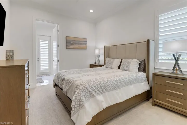 Third bedroom featuring light carpet and recessed lighting, on suite pool bathroom