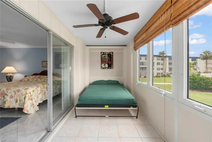 Sun room offers a built-in Murphy's bed for additional sleeping arrangements
