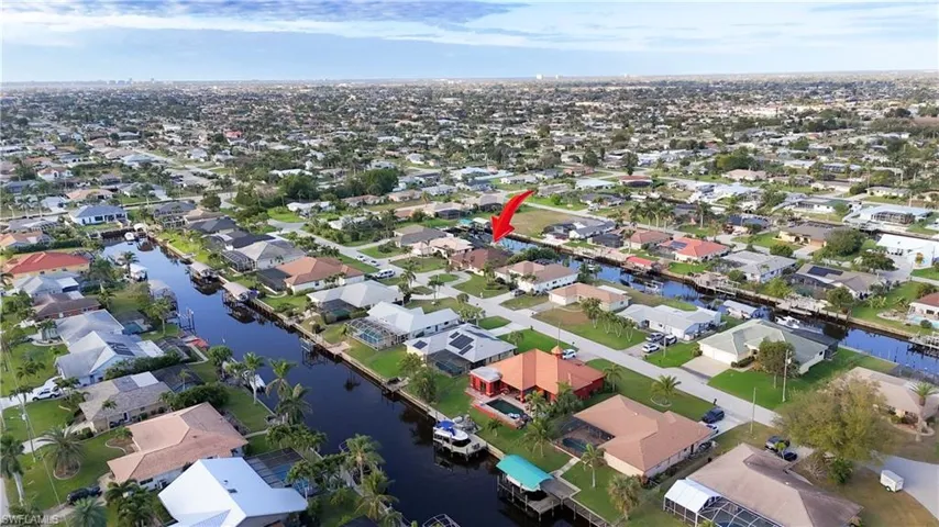 Aerial view with a residential view and a water view