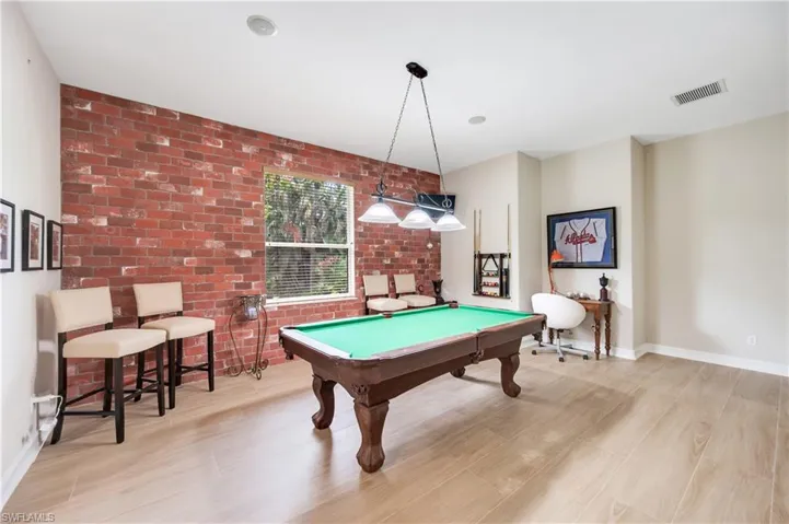 2116 Harlans Run, Naples, Florida 34105