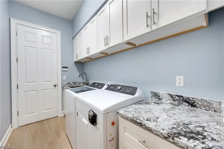 2116 Harlans Run, Naples, Florida 34105
