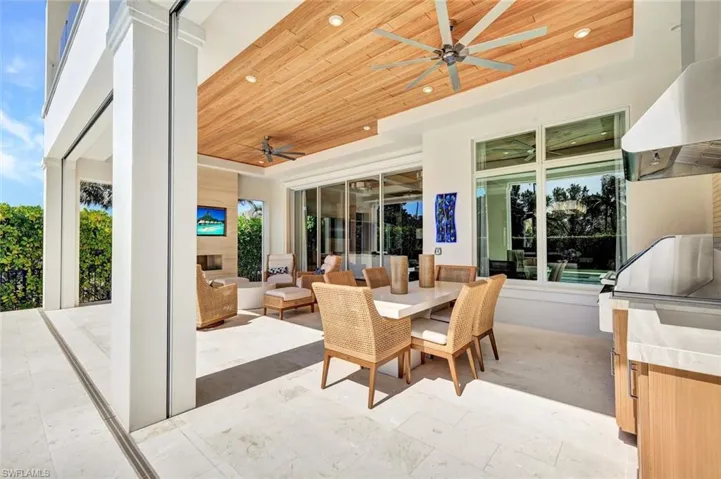 View of patio / terrace with outdoor lounge area and a ceiling fan