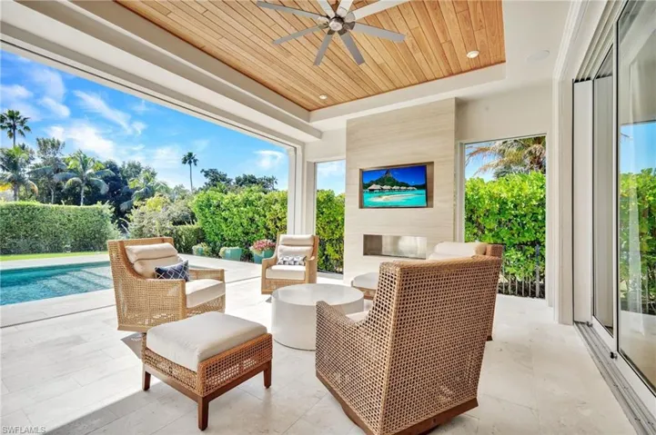 View of patio / terrace with a ceiling fan and outdoor seating