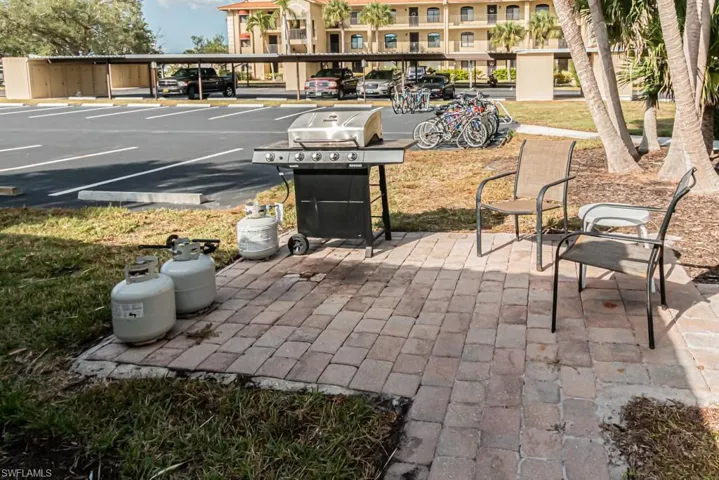 Grill area next to gazebo.