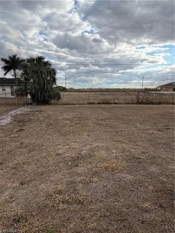 View of yard with a view of countryside