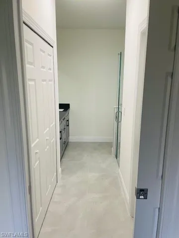 Bathroom with vanity and a shower stall