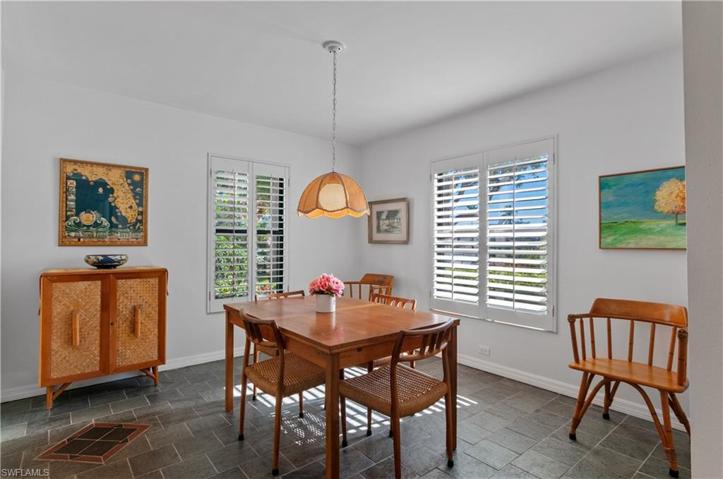 Dining room with lots of windows and light