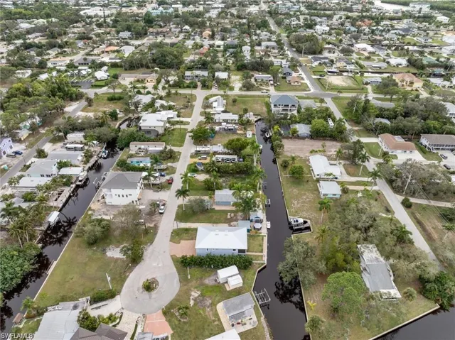 View of property location with nearby suburban area