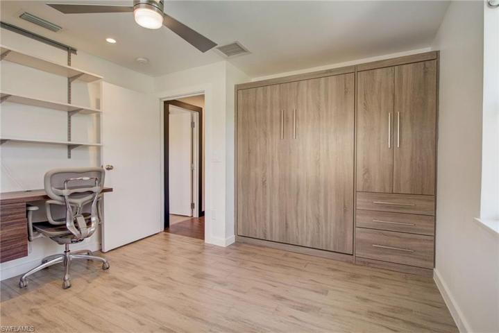 Guest bedroom/ office with built ins and Murphy Bed with Closet