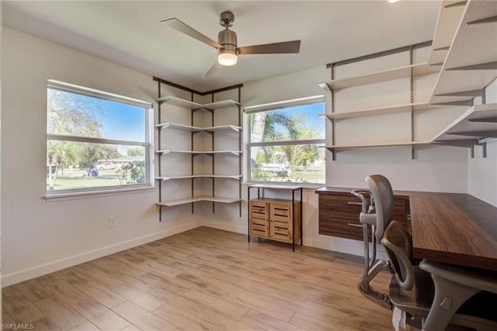 Guest bedroom/ office with built ins and Murphy Bed with Closet