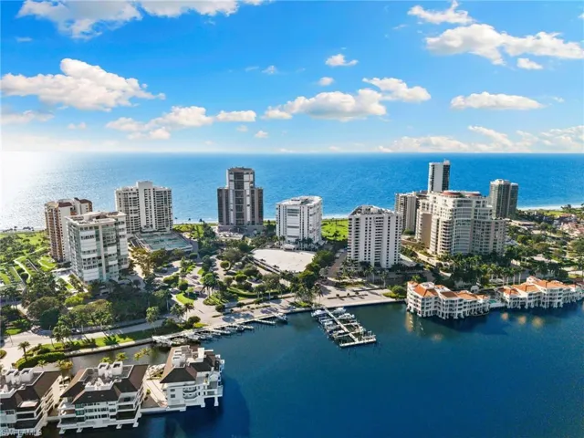 View of urban area featuring a nearby body of water and numerous boat docks
