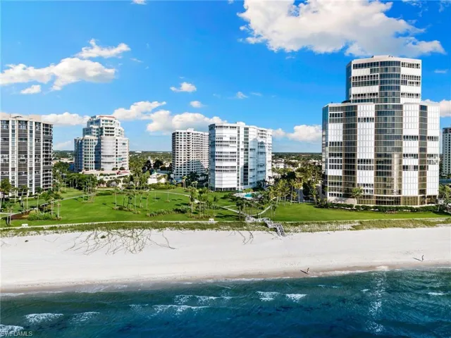 View of urban area with waterfront with a beach