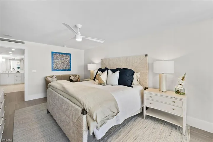 Bedroom featuring light wood-style flooring and ceiling fan