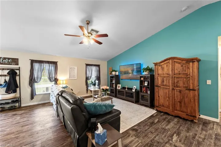 Living room featuring luxury vinyl plank flooring installed in 2021
