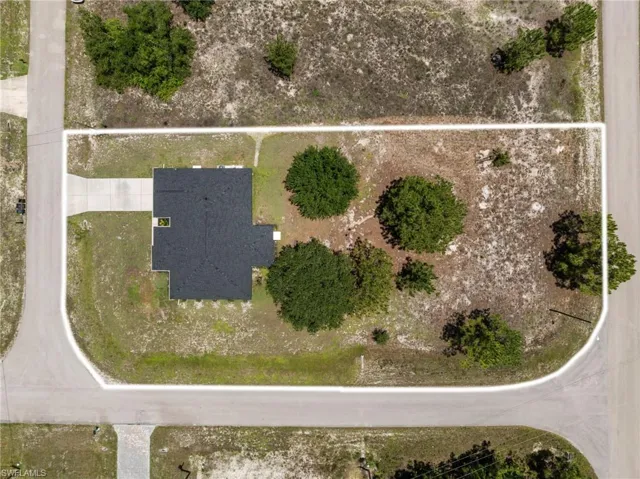 Beautiful curb appeal with fresh paint and a new roof. Situated on over a 1/2 acre of land!