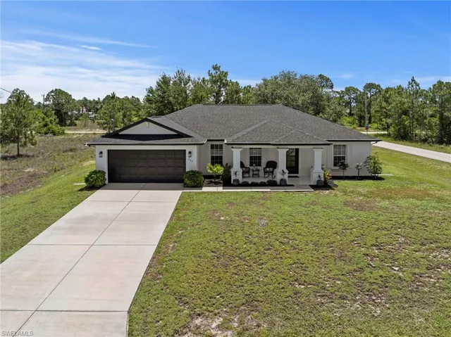 Beautiful curb appeal with fresh paint and a new roof. Situated on over a 1/2 acre of land!